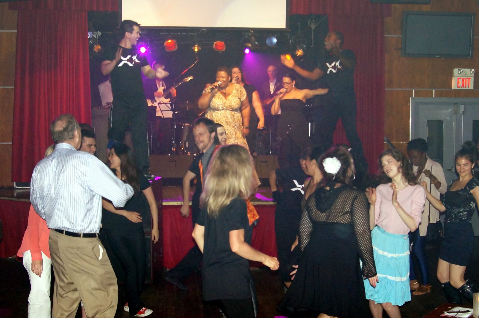Carolyn T on stage with the band at Diva Night